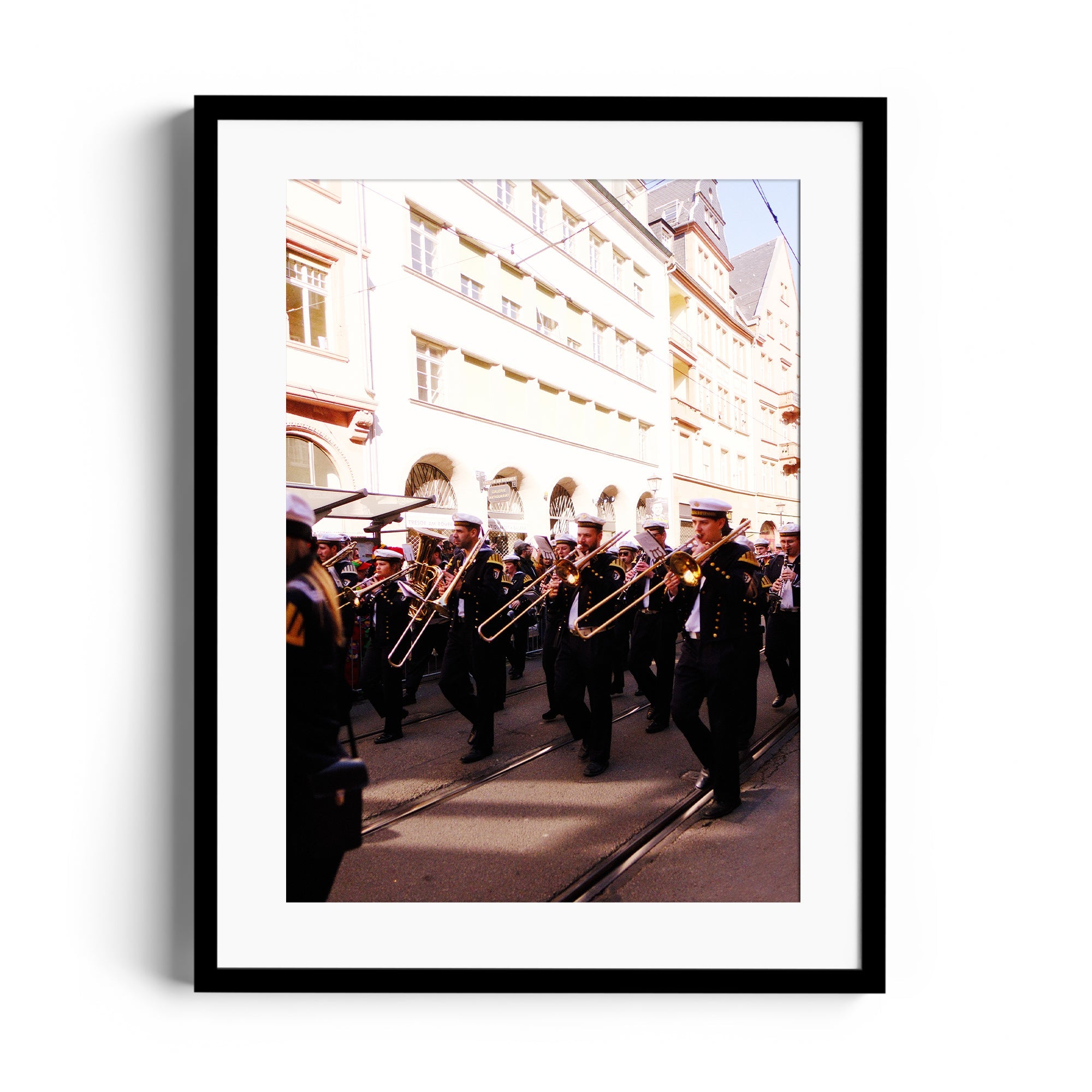 Framed fine art photograph of a marching band with trombones in Wiesbaden, highlighting musical elegance by Marcelo Cadavid.
