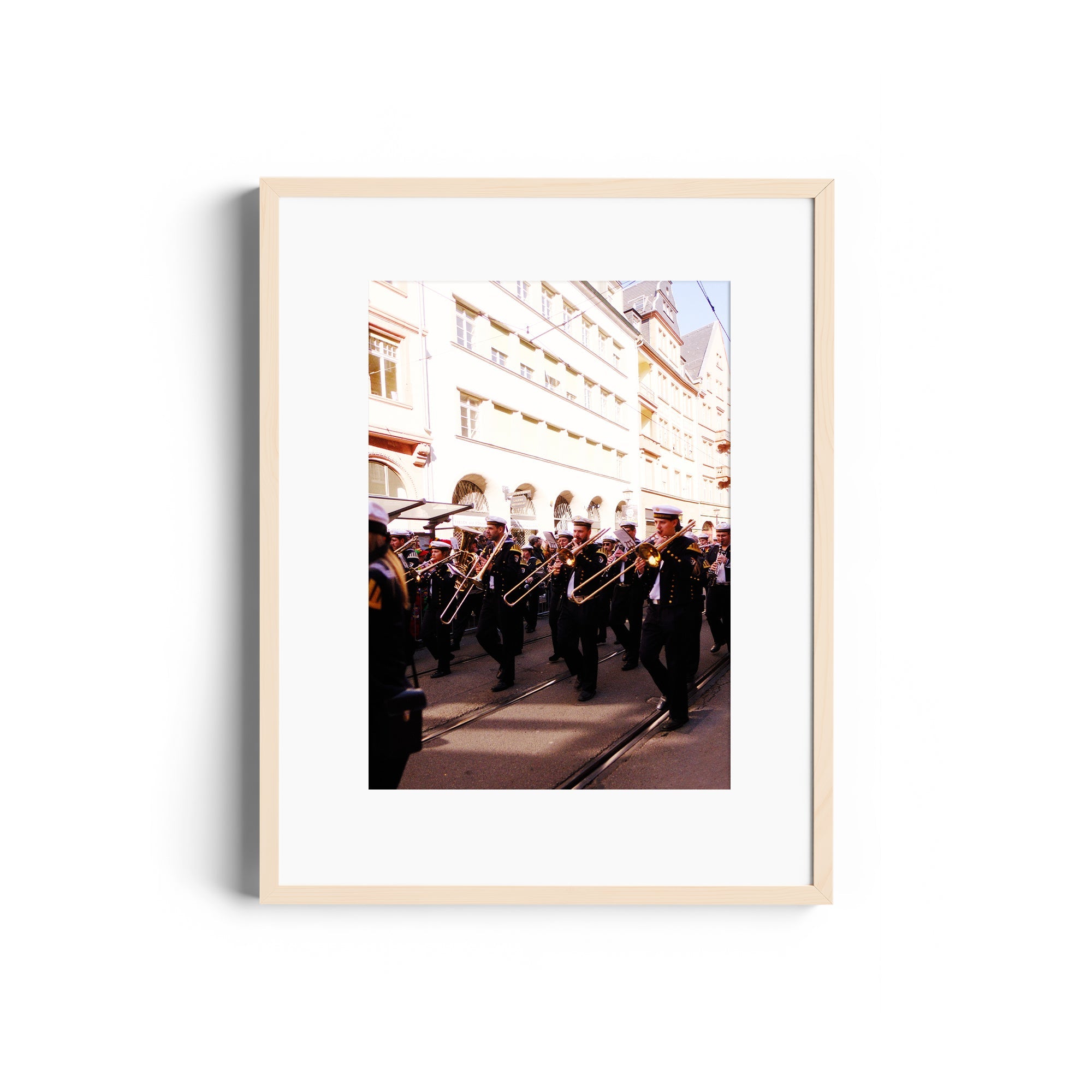 Framed fine art photograph titled 'ARPEGGIOS' featuring a marching band in Wiesbaden, enhancing any collection from The Dana Gallery.