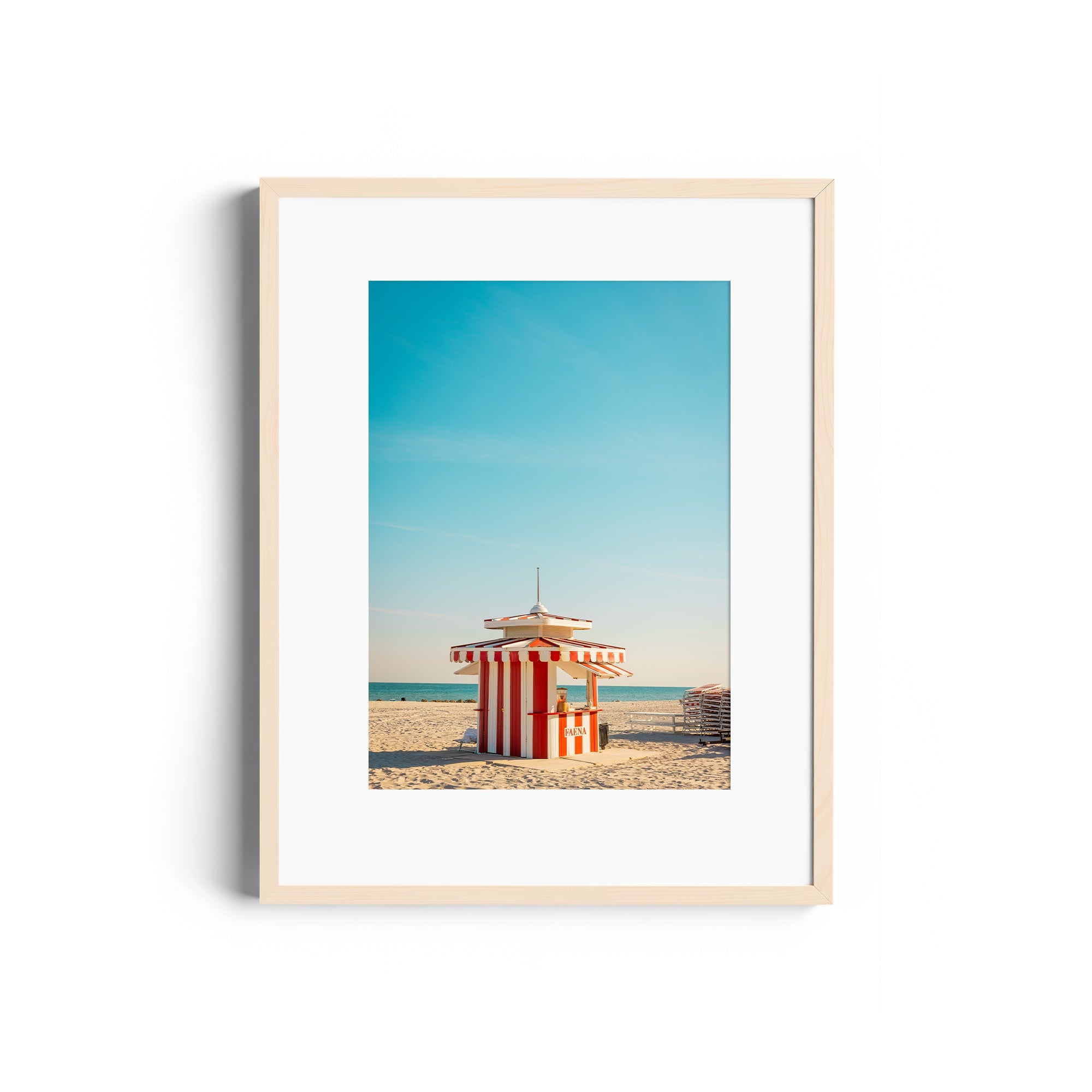 Framed fine art photography of a Miami beach lifeguard station in pastel colors, showcasing the city's vibrant character.