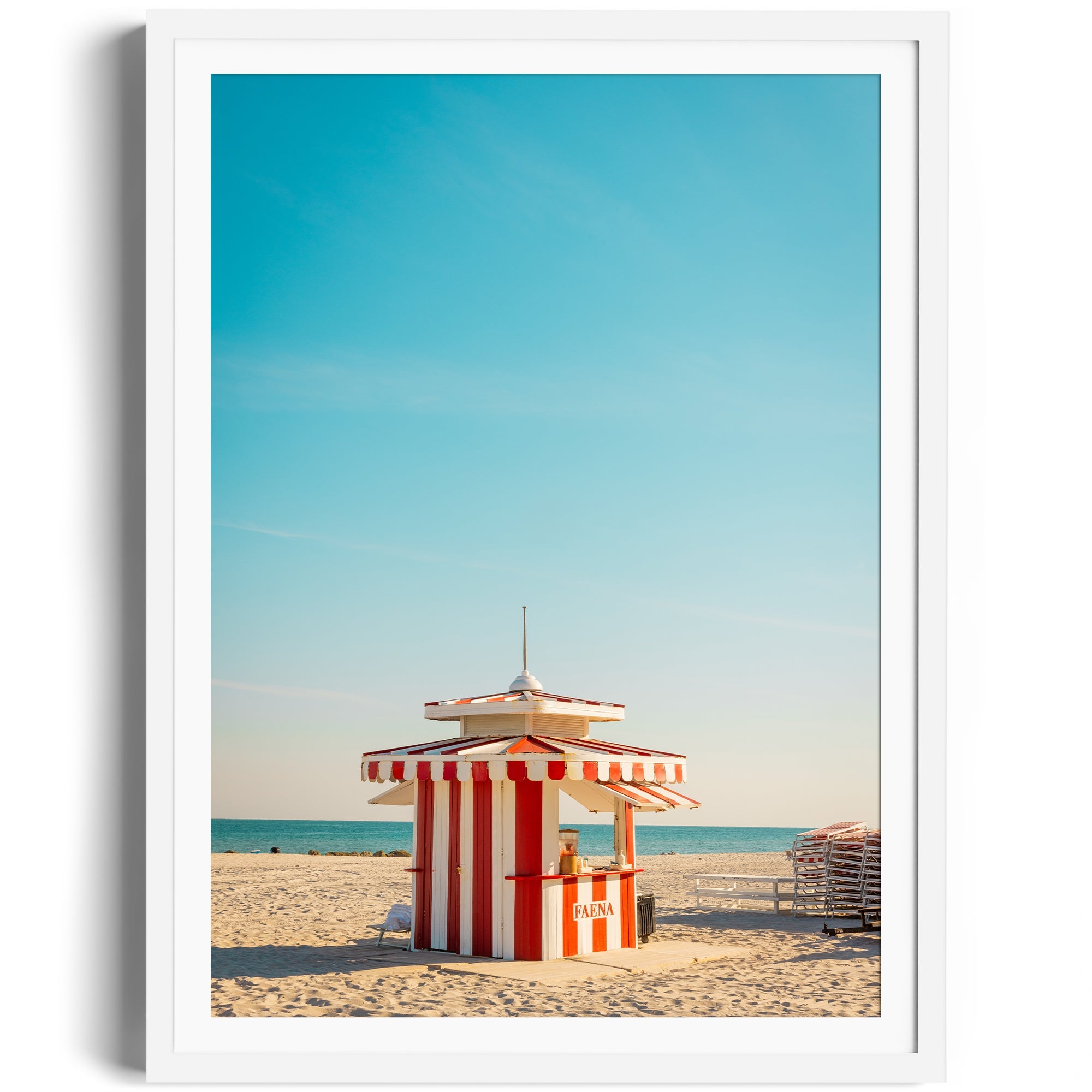 Framed fine art photograph of a striped beach hut on Miami's sunny shore, showcasing vibrant colors and tropical ambiance.