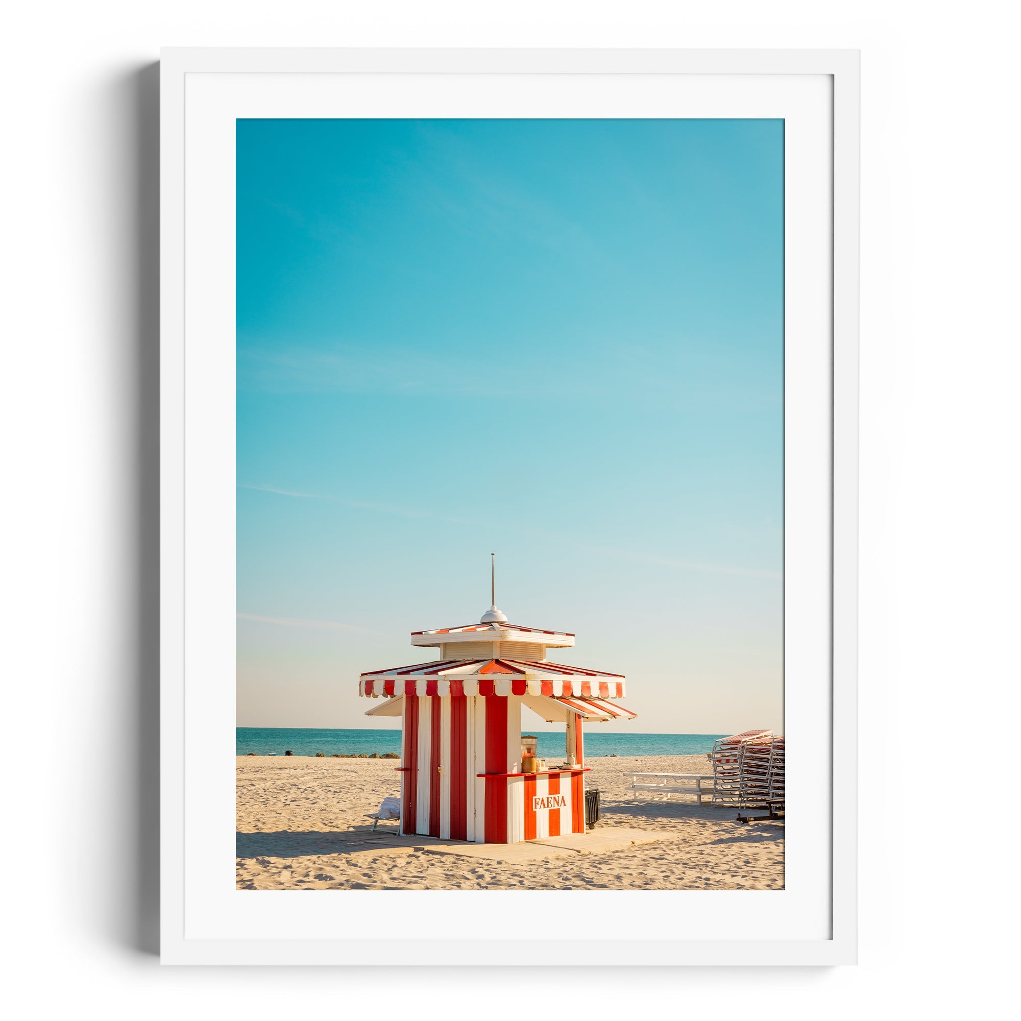 Framed fine art photograph of a red and white striped beach hut in Miami, showcasing vibrant colors and coastal scenery.