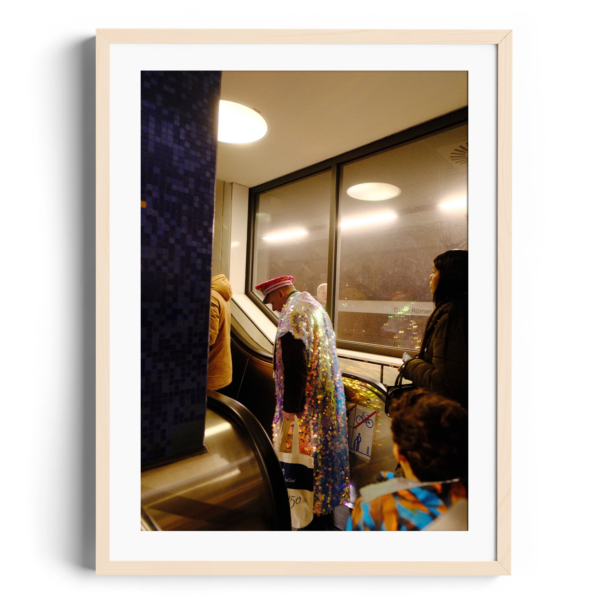 Captivating scene of a person in a sequined outfit on an escalator, framed fine art photography by Marcelo Cadavid.