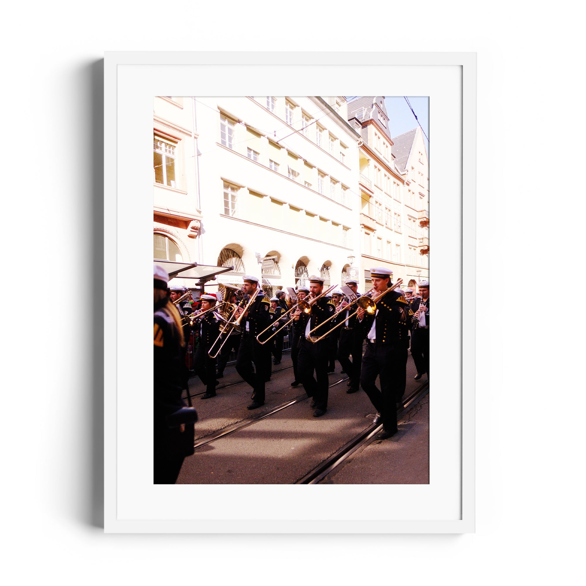 Framed fine art photograph of a marching band with brass instruments, captured in an urban setting in Wiesbaden.