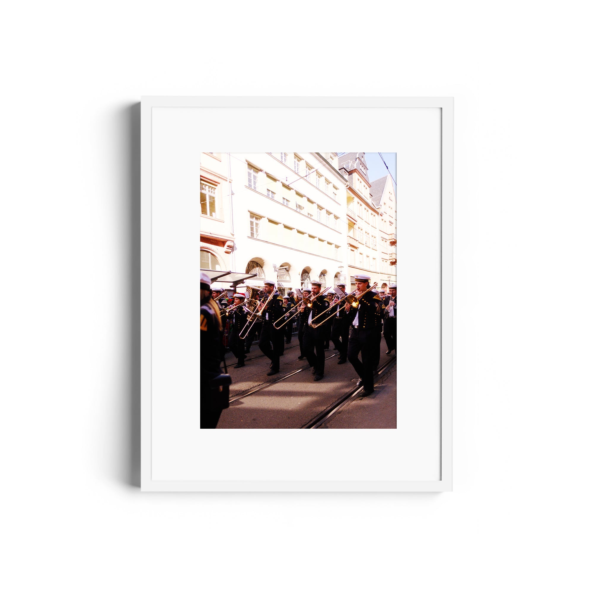 Framed fine art photograph of a brass band parade in Wiesbaden, showcasing elegance at The Dana Gallery, Miami, Florida.