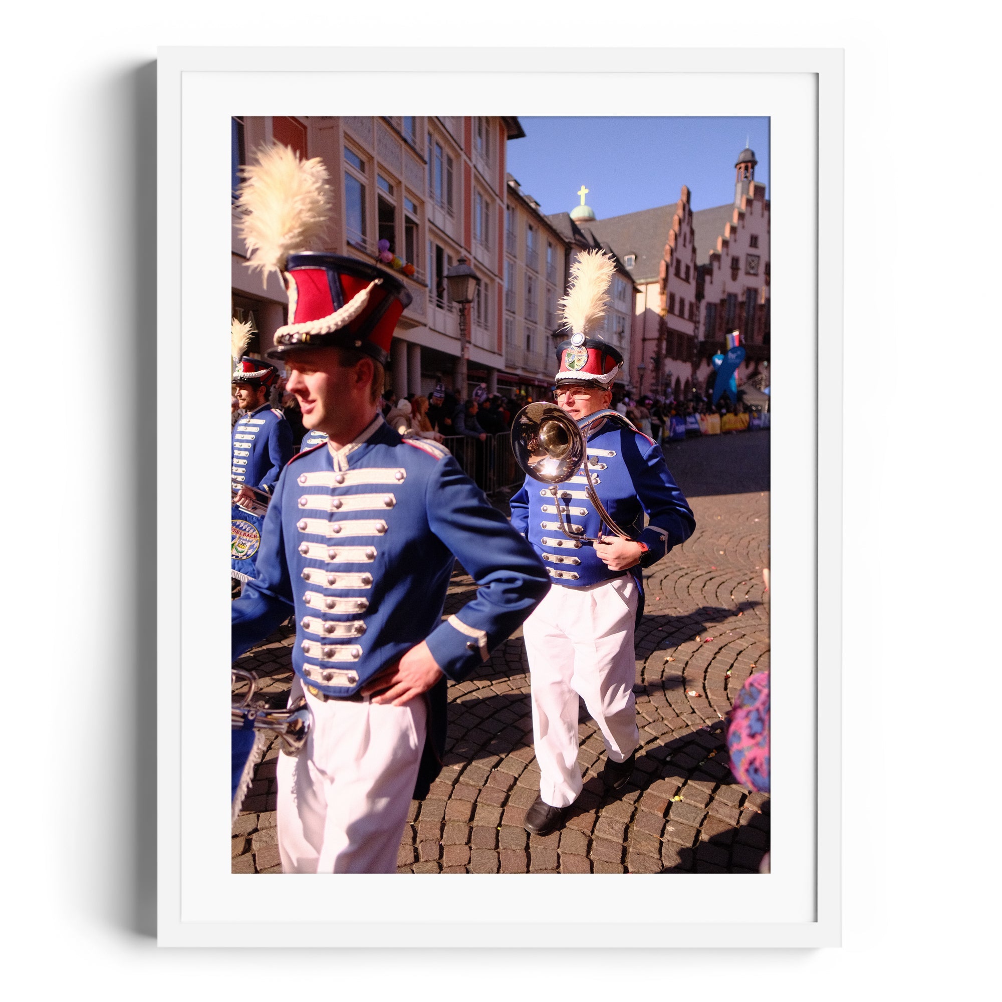 Framed limited edition fine art photograph of musicians in blue uniforms marching in a parade, capturing tradition and elegance.