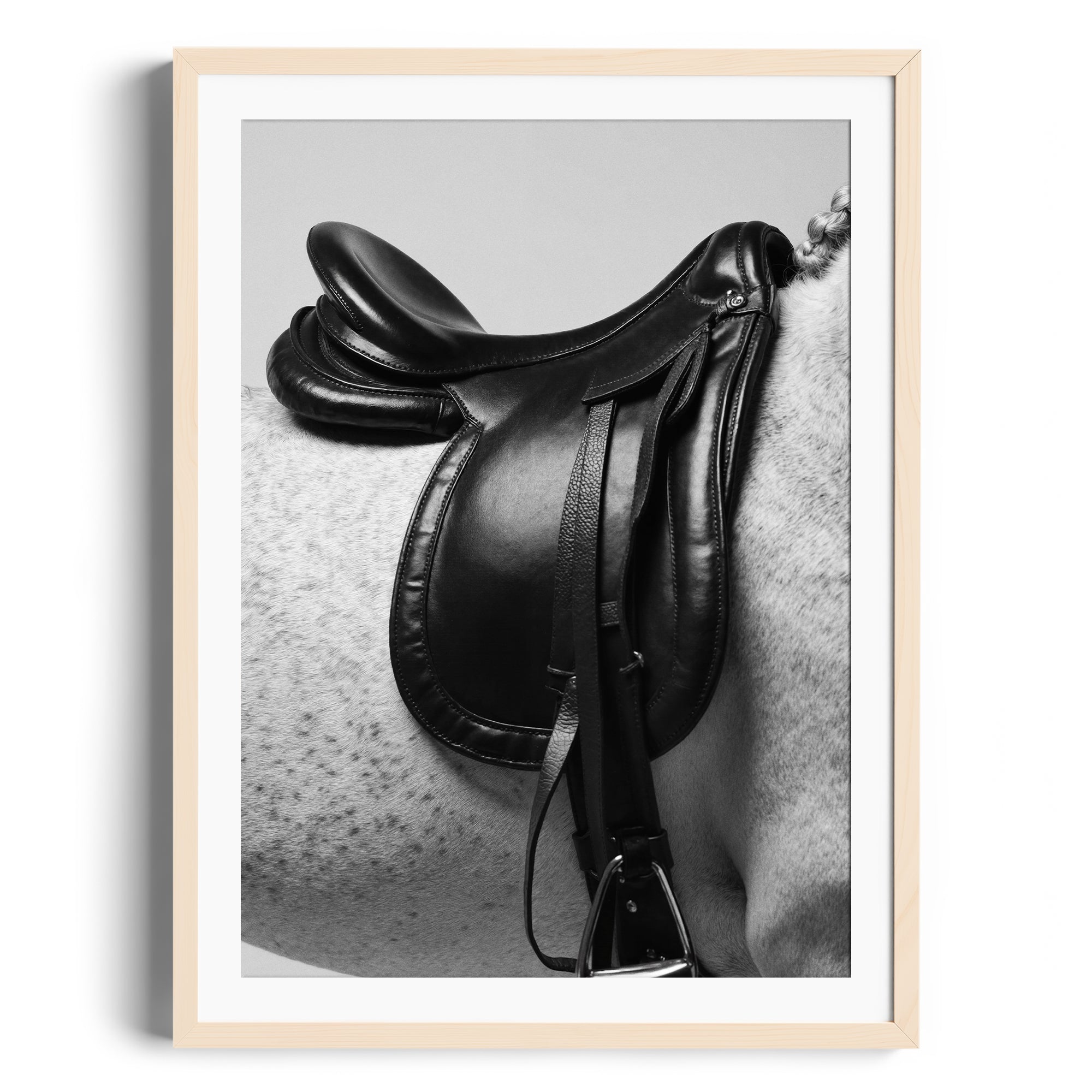 Limited edition fine art print of an English saddle on a dappled grey horse, showcasing equestrian elegance. Miami gallery.