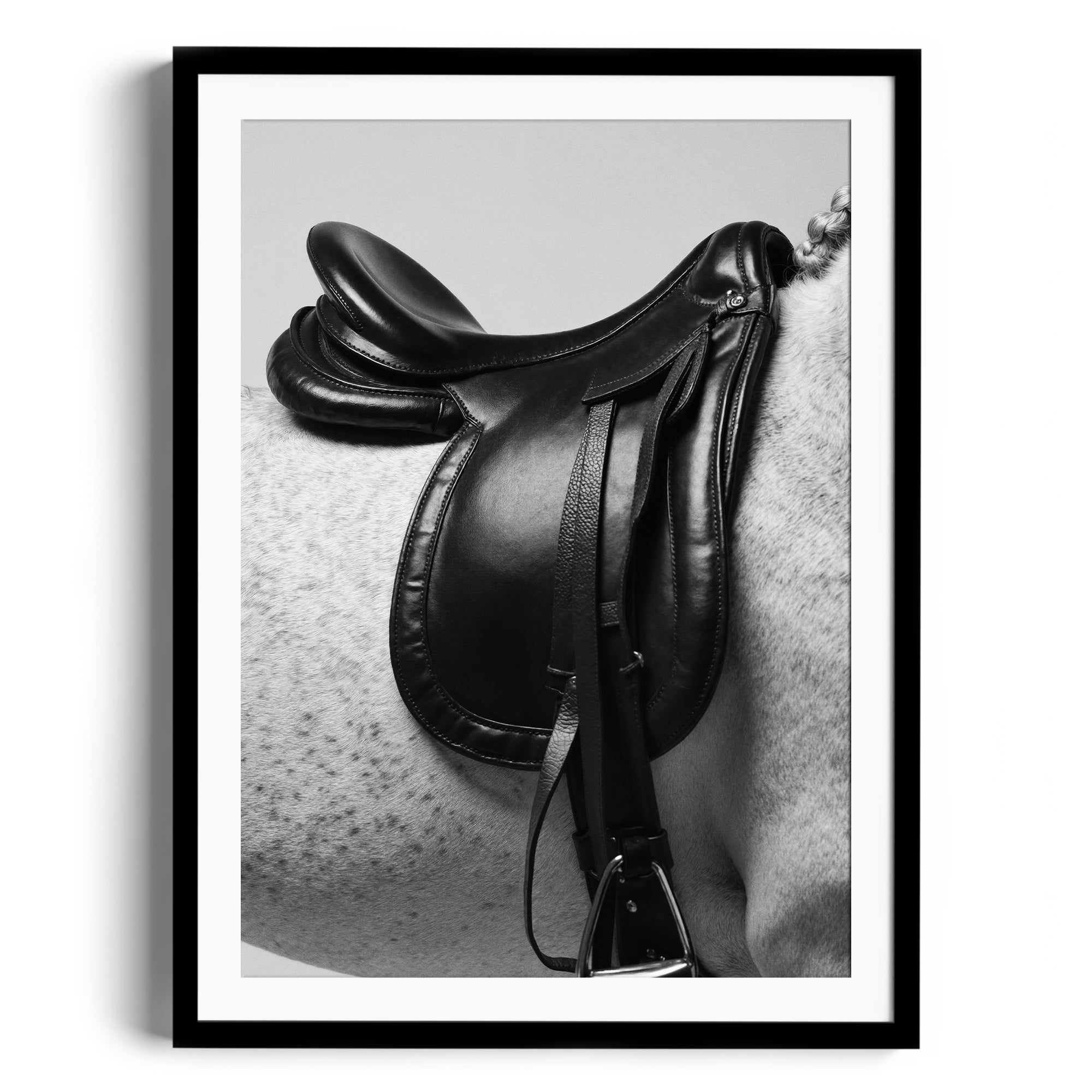 Limited edition print "CROW" by Diego Cadavid featuring a black saddle on a dappled grey horse, showcasing equestrian elegance.