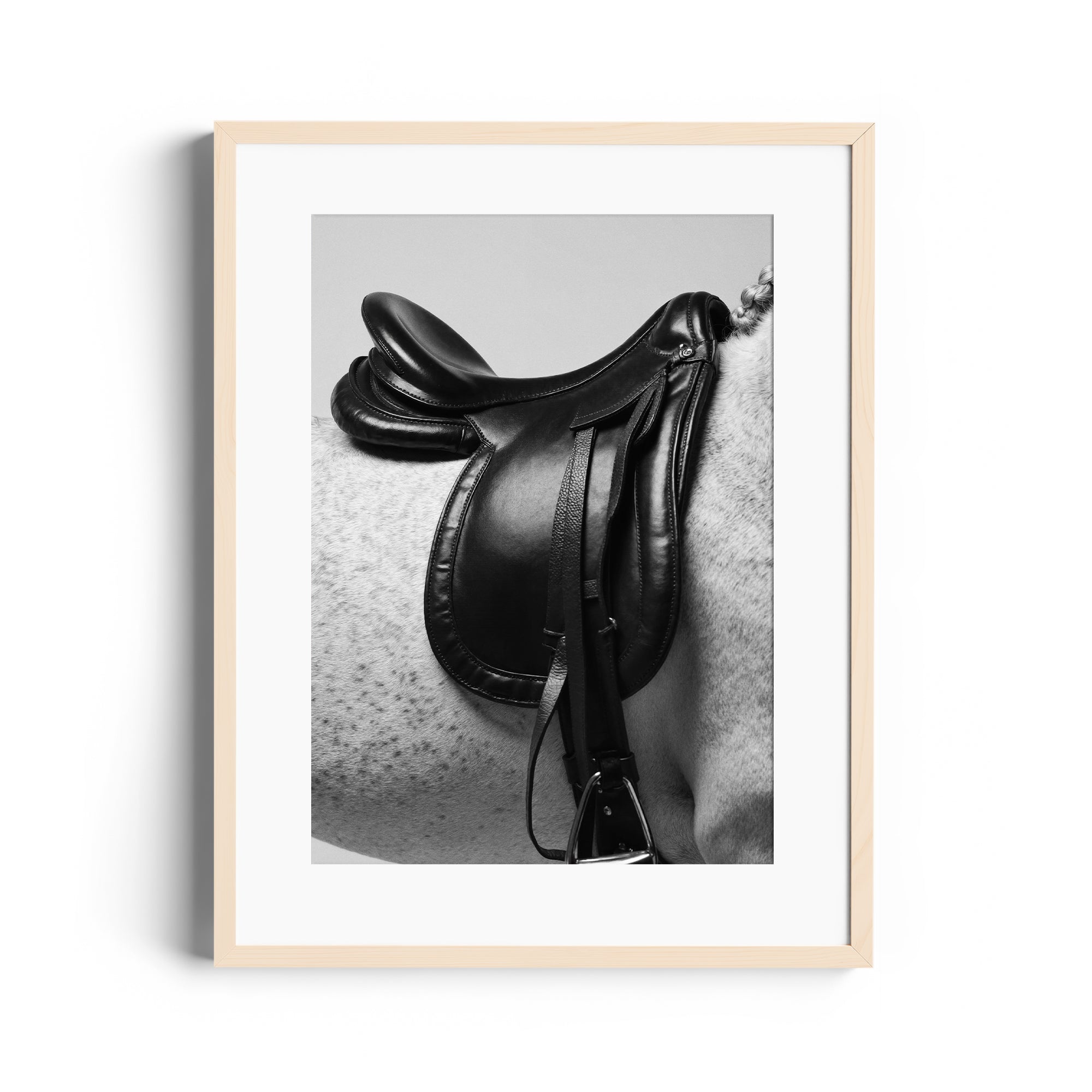 Limited edition fine art print of a black saddle on a grey horse, showcasing equestrian elegance in Miami gallery style.