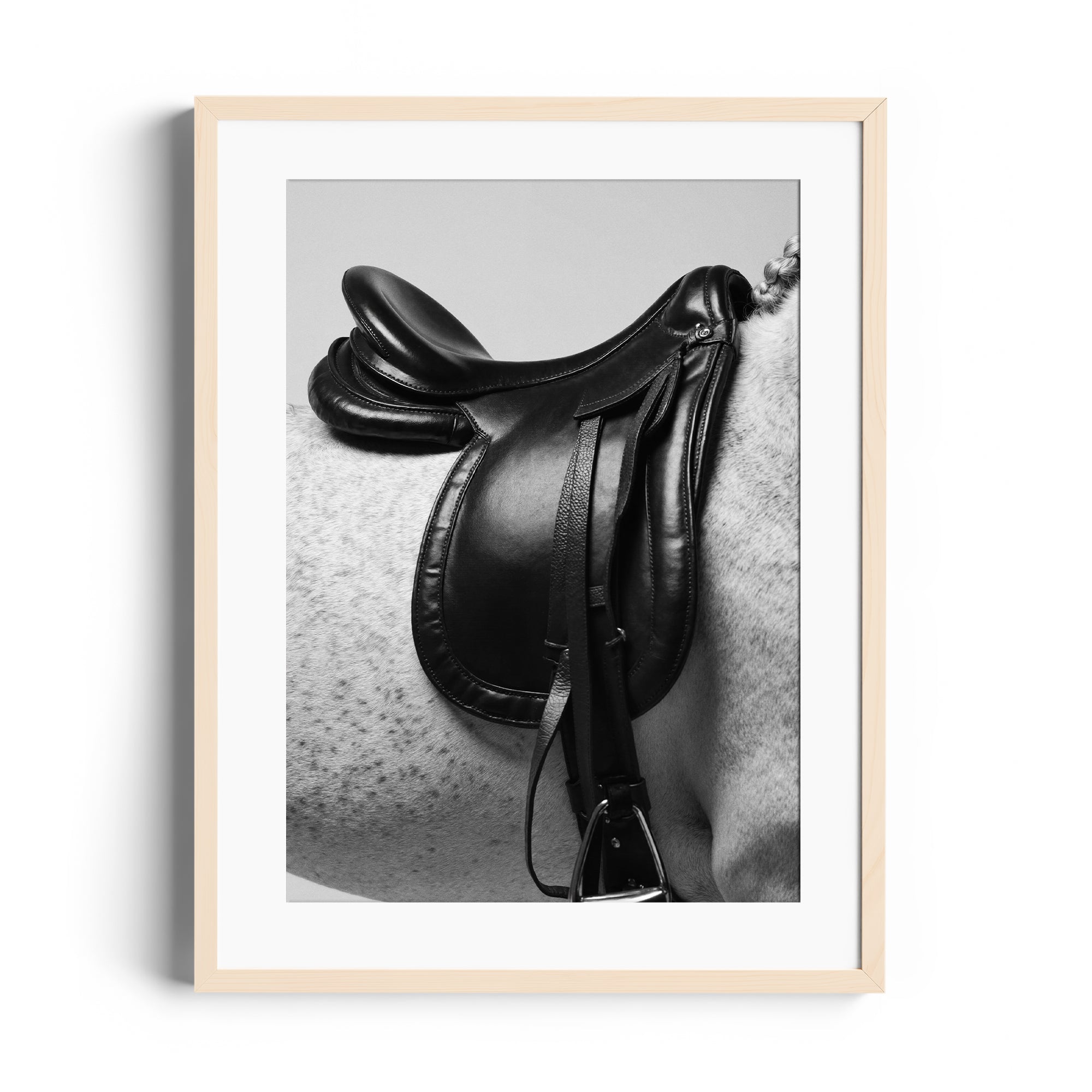 Limited edition fine art print of an English saddle on a dappled grey horse, showcasing equestrian elegance in Miami.