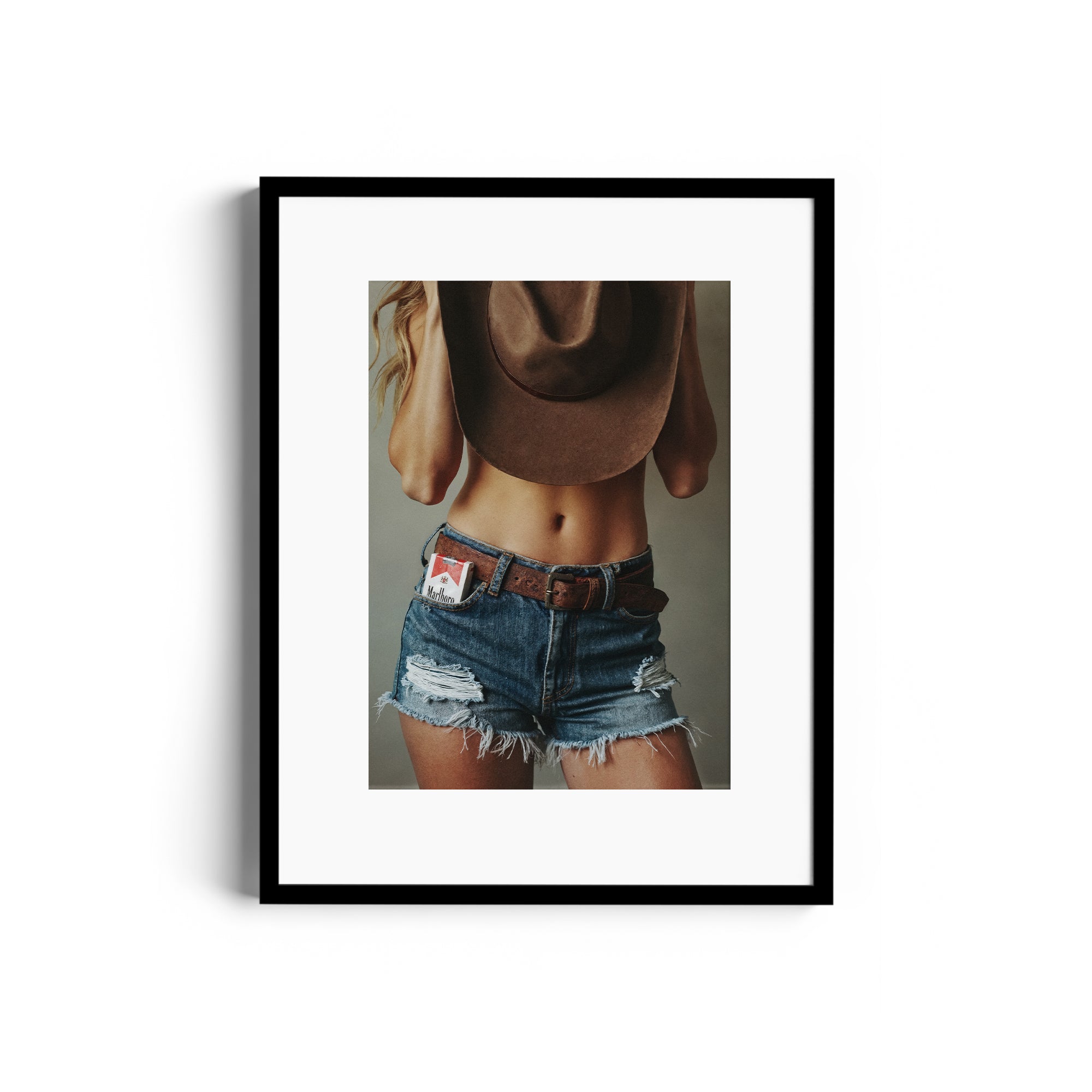 Limited edition fine art photography print DIAMONT showcasing denim shorts and cowboy hat in Miami gallery.