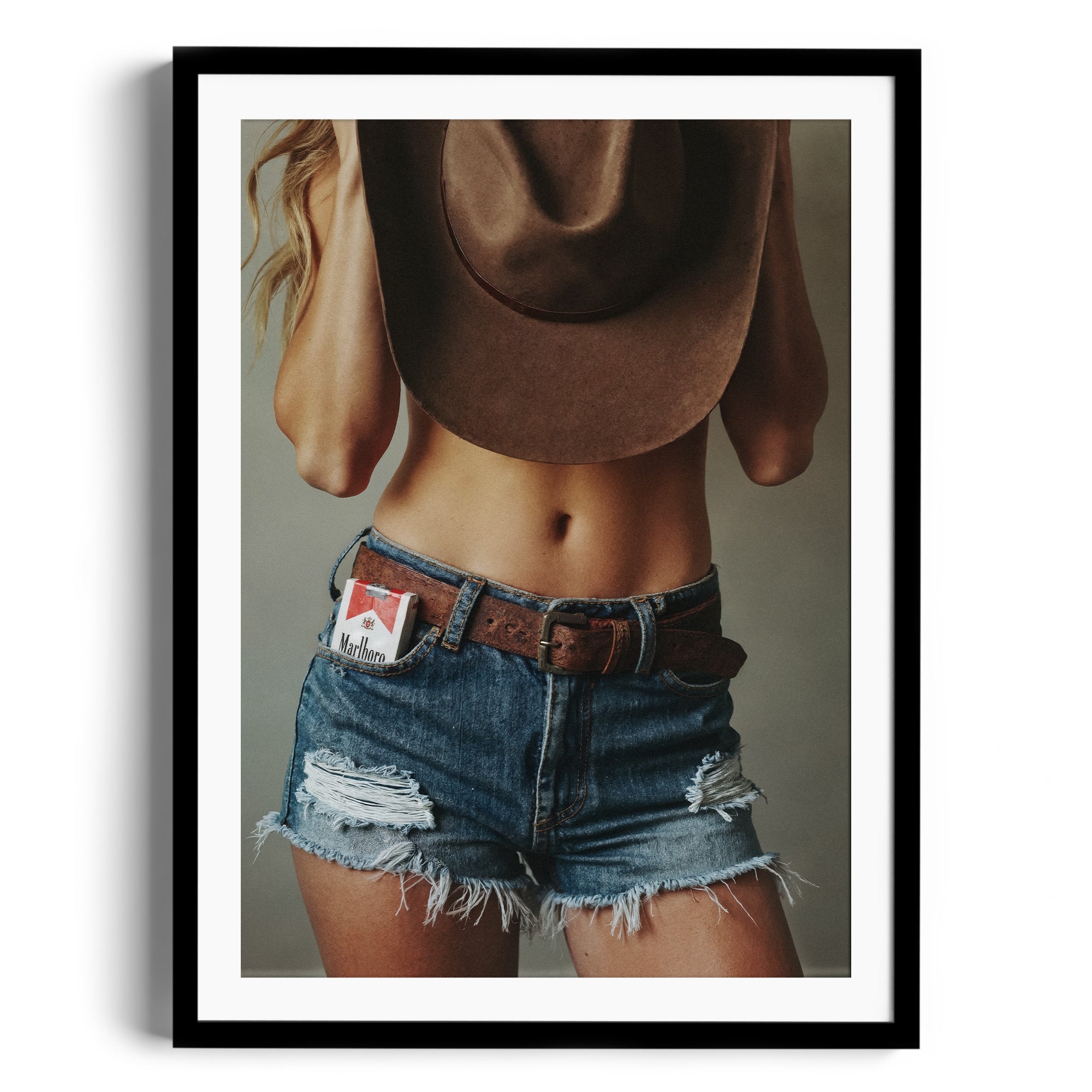 Limited edition fine art photography DIAMONT featuring a woman in distressed denim shorts and cowboy hat, Miami gallery print.