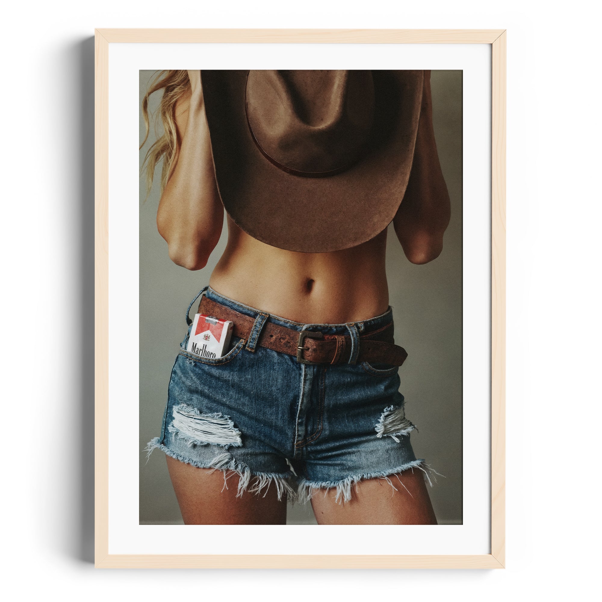 Limited edition fine art print "DIAMONT" featuring a stylish model in distressed denim and cowboy hat, Miami gallery.