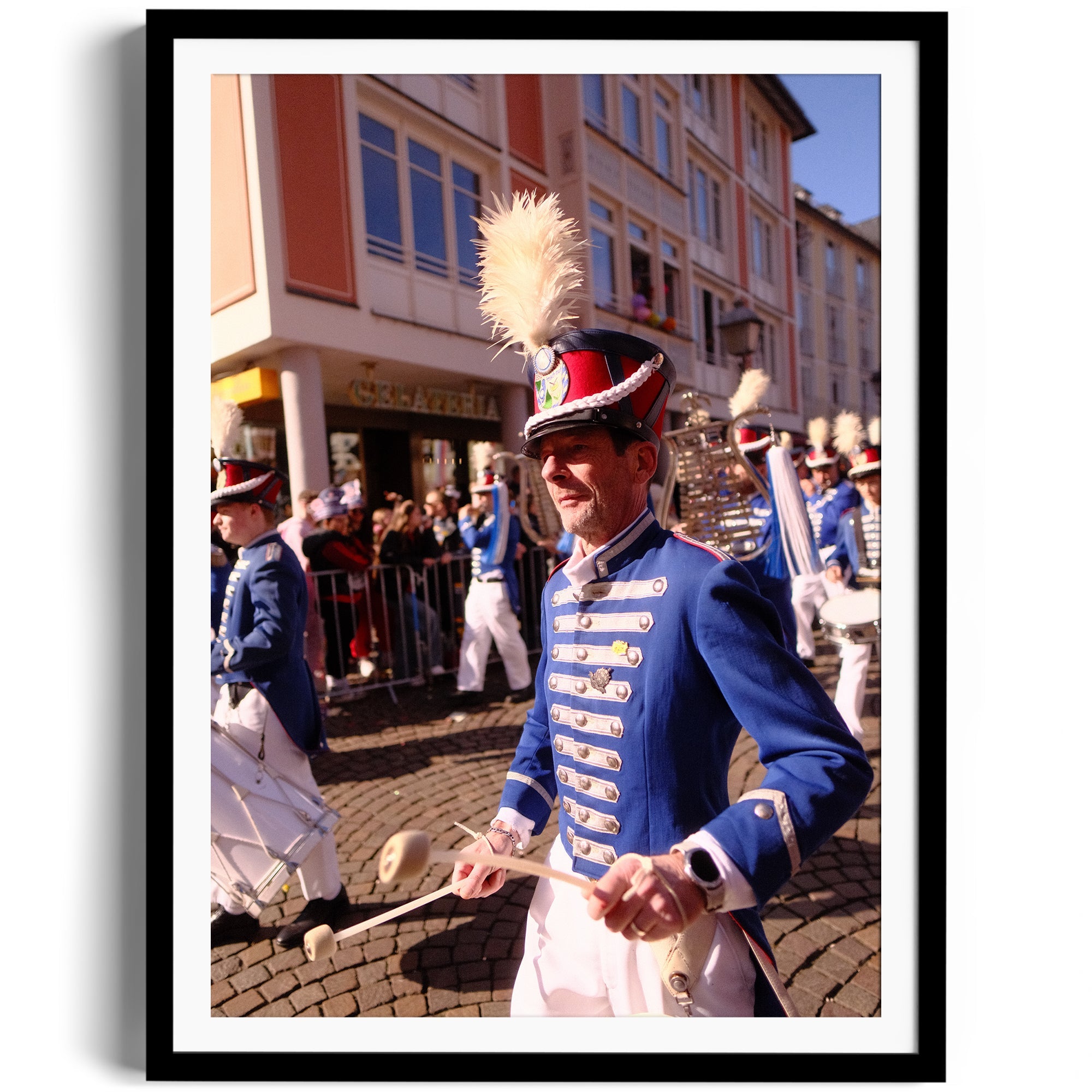 Festive parade scene featuring musicians in blue uniforms, captured in vibrant detail for fine art display.