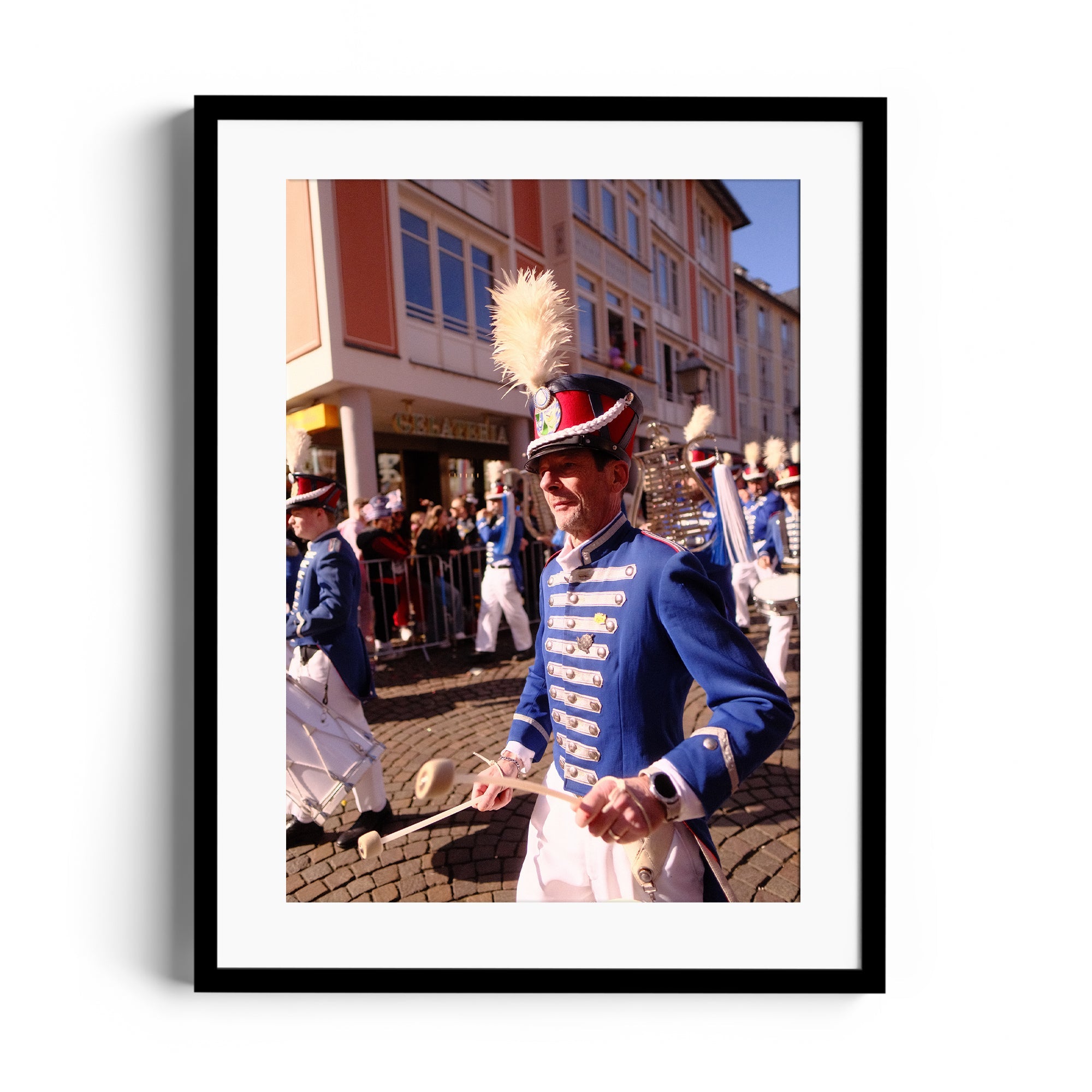 Framed fine art photography of a musician in a blue uniform performing during a parade in Wiesbaden, Germany.