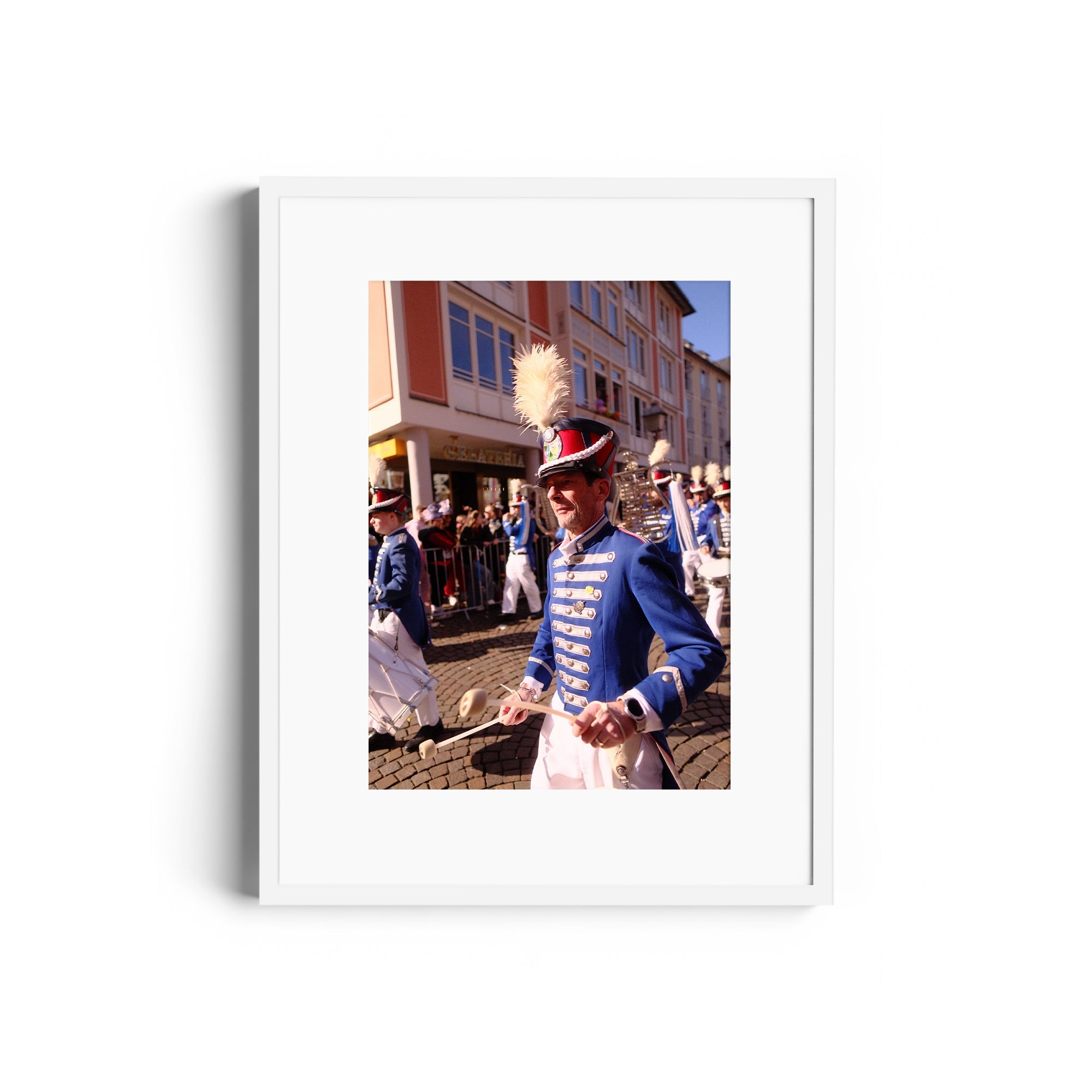 Framed fine art photo of a parade participant in traditional blue uniform, showcasing vibrant cultural festivities.