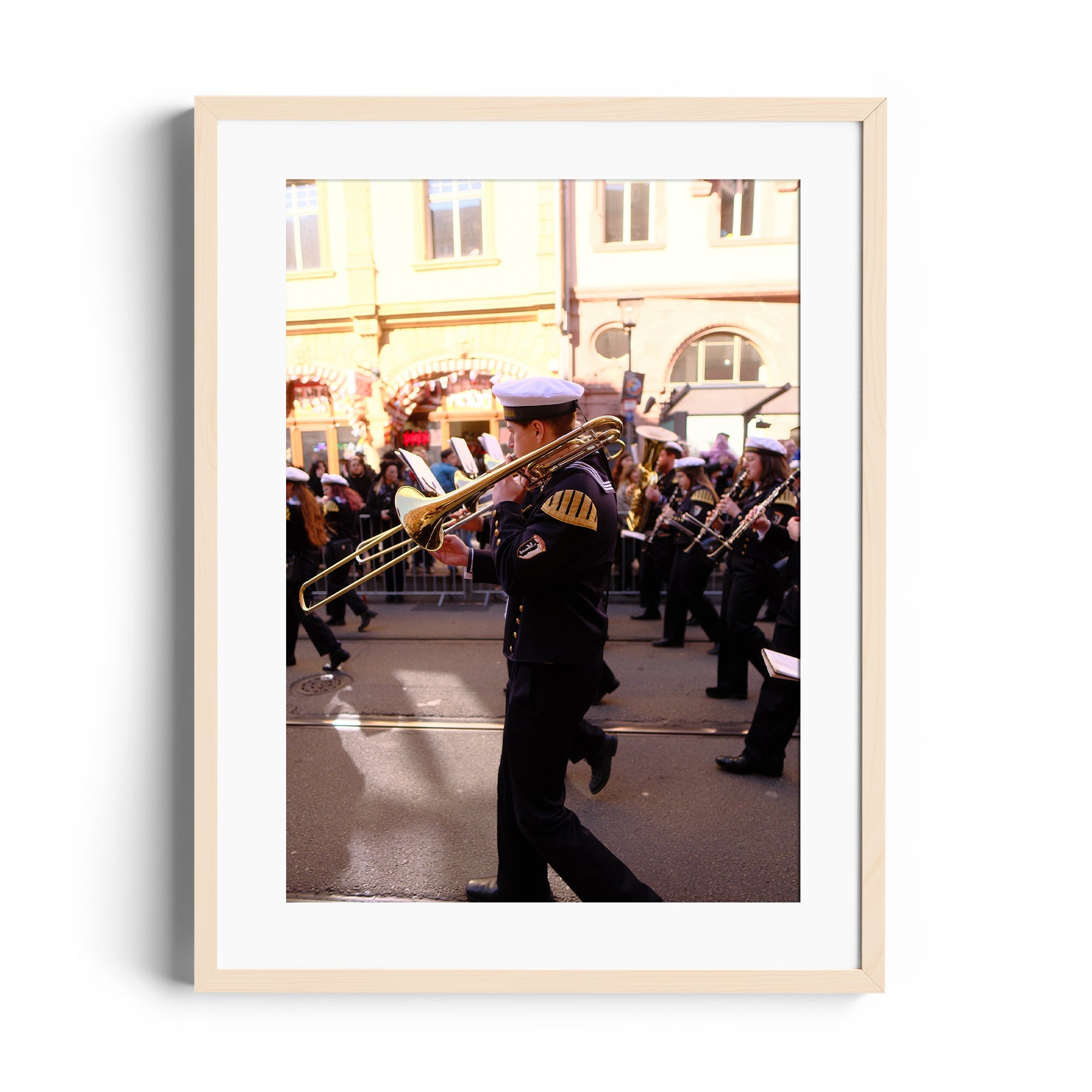 Framed fine art photo of a musician in uniform playing a trombone during a parade, inspired by Marcelo Cadavid's 'Flow'.