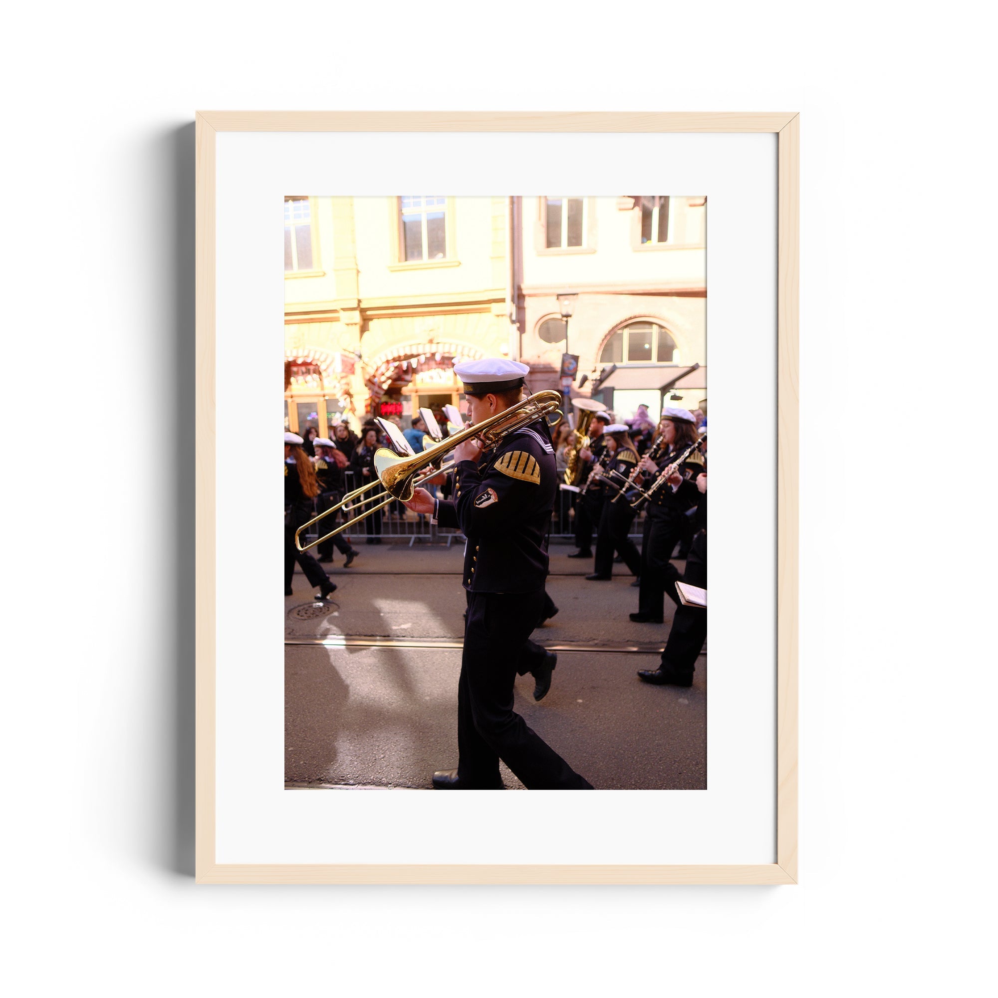 Framed fine art photo of a musician playing trombone in a parade, featured at The Dana Gallery, Miami, Florida.