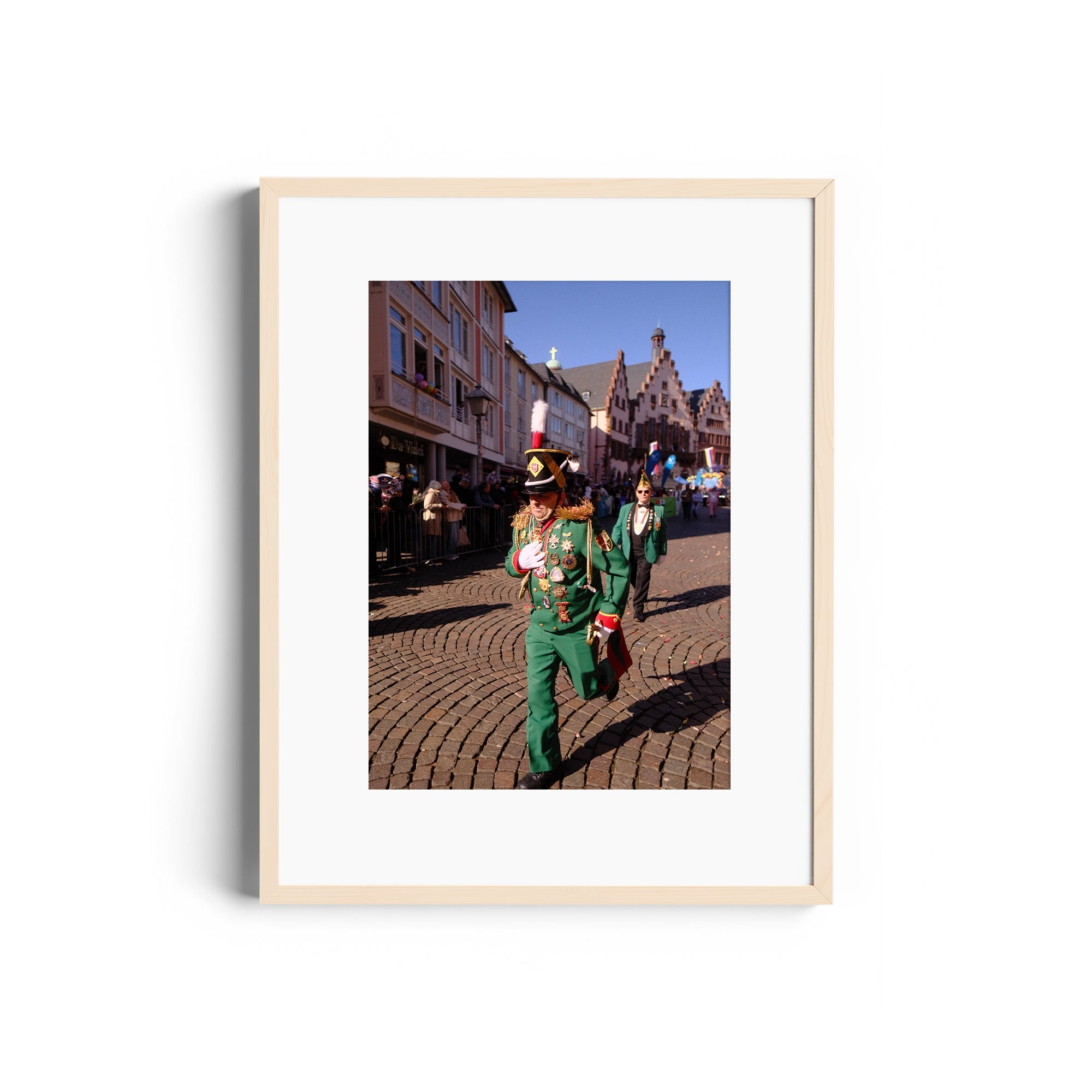 Framed artwork depicting a vibrant parade scene with musicians in green, highlighting fine art photography elegance.