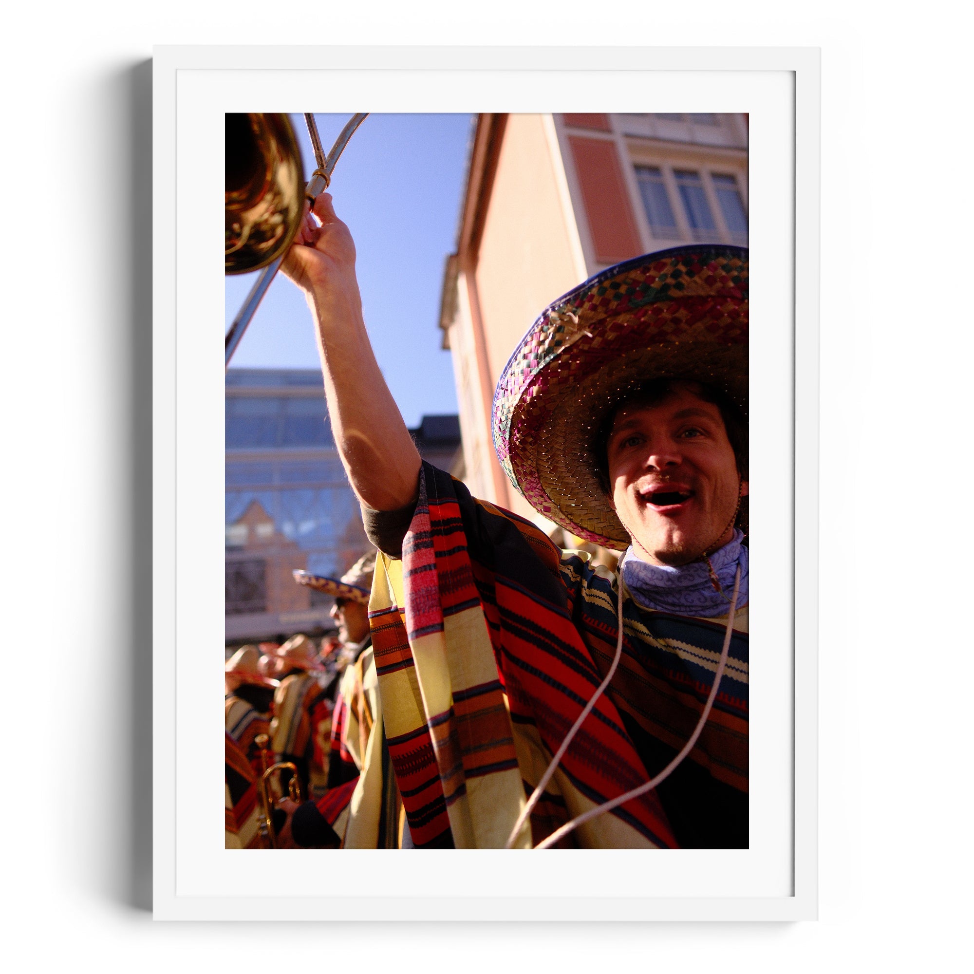 Joyful mariachi musician in vibrant attire, celebrating in Miami, showcasing fine art from THE DANA GALLERY.