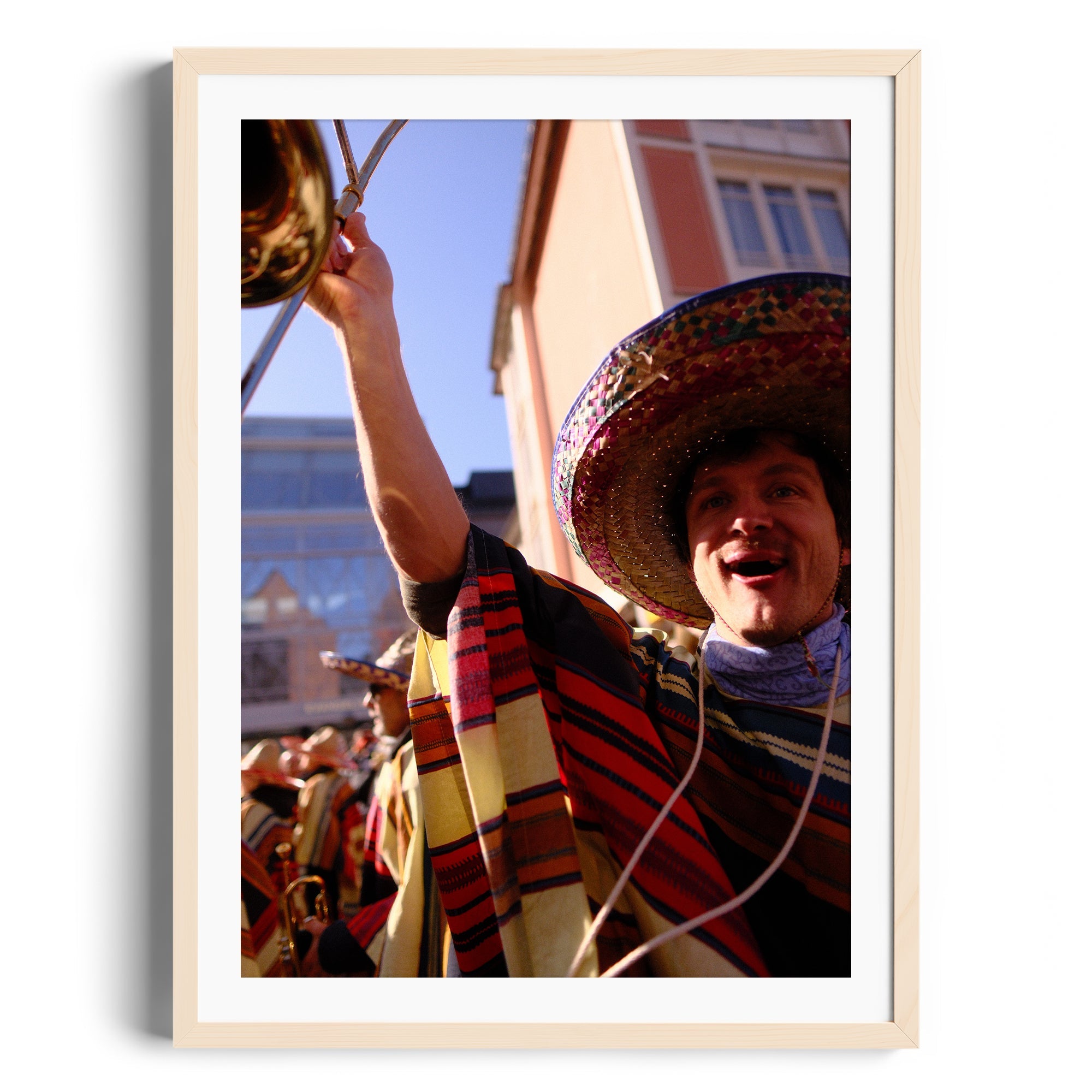 Framed fine art photograph of a mariachi musician in vibrant attire, showcased at The Dana Gallery, Miami, Florida.