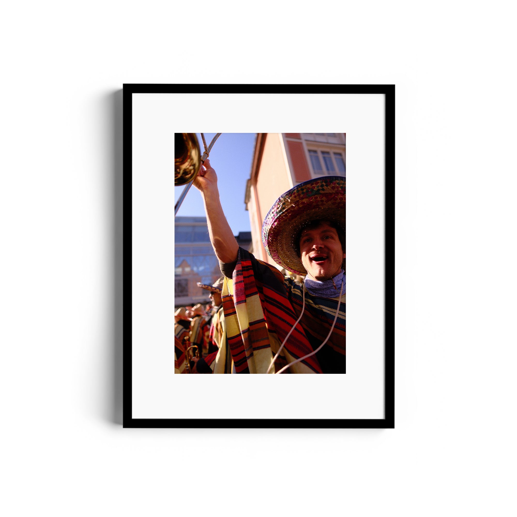 Framed fine art photograph of a joyous mariachi musician celebrating, showcased in The Dana Gallery, Miami, Florida.