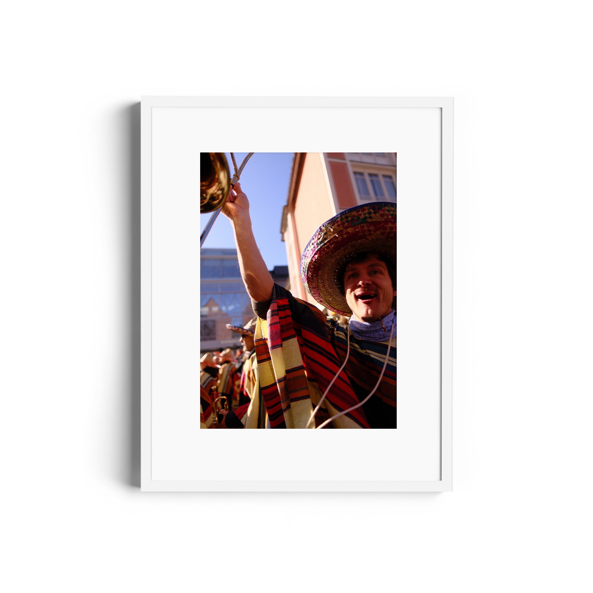 Vibrant fine art photography of a mariachi musician celebrating, framed art by Marcelo Cadavid at The Dana Gallery, Miami, Florida.