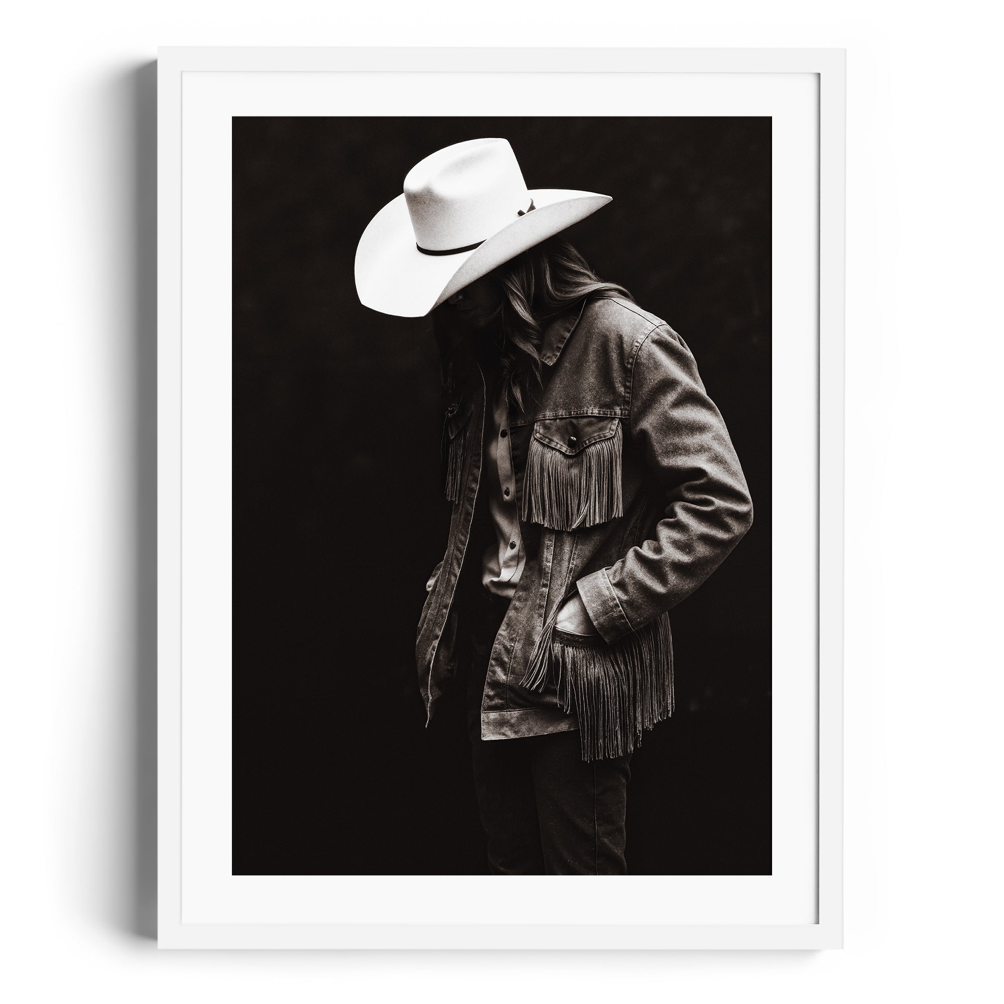 Limited edition monochromatic portrait of a figure in a fringed denim jacket and cowboy hat, fine art print for gallery in Miami.