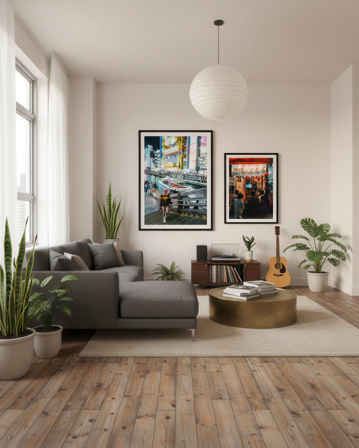 Modern living room with gray sofa, coffee table, and wall art