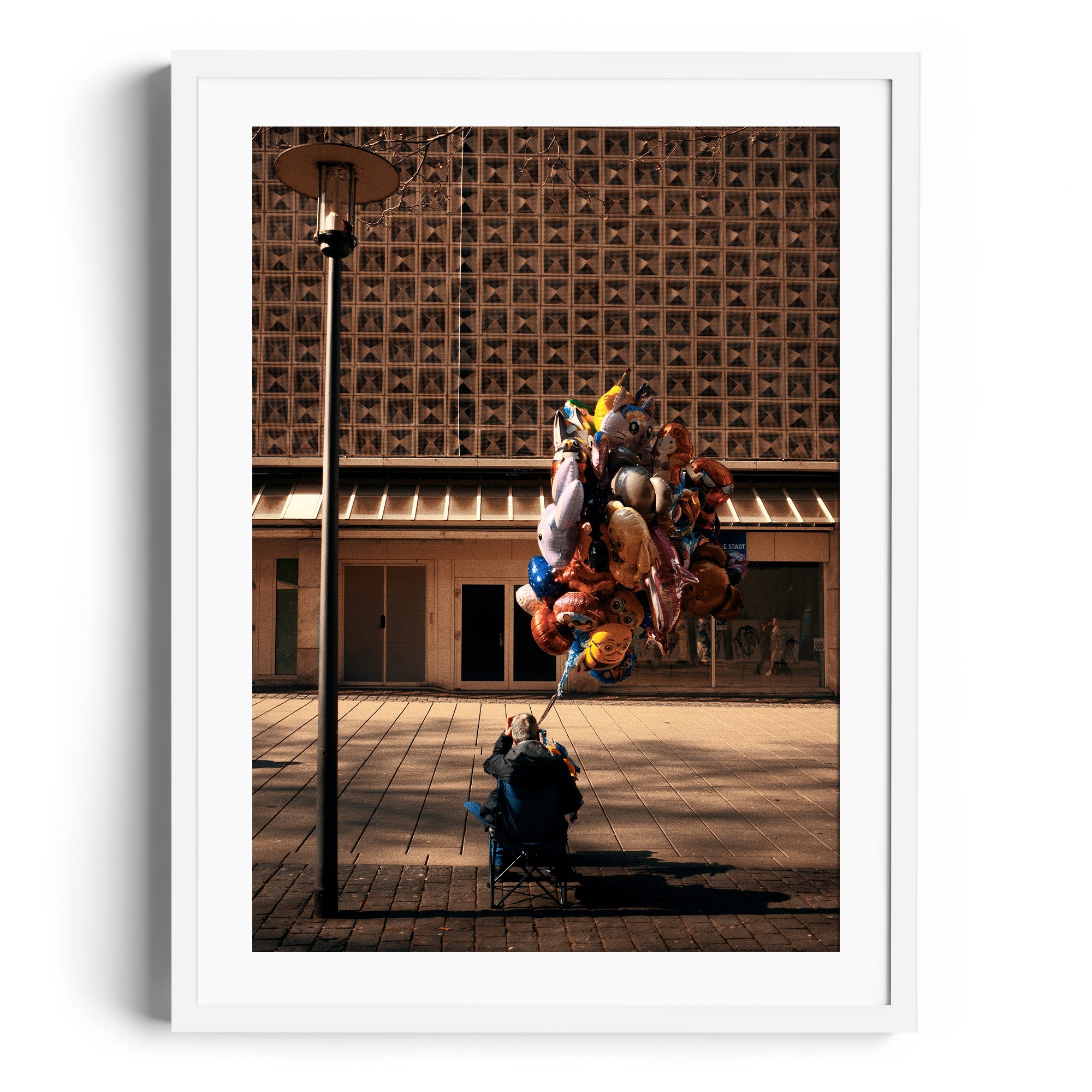 Framed fine art photography of a balloon vendor in Miami, showcased at The Dana Gallery.